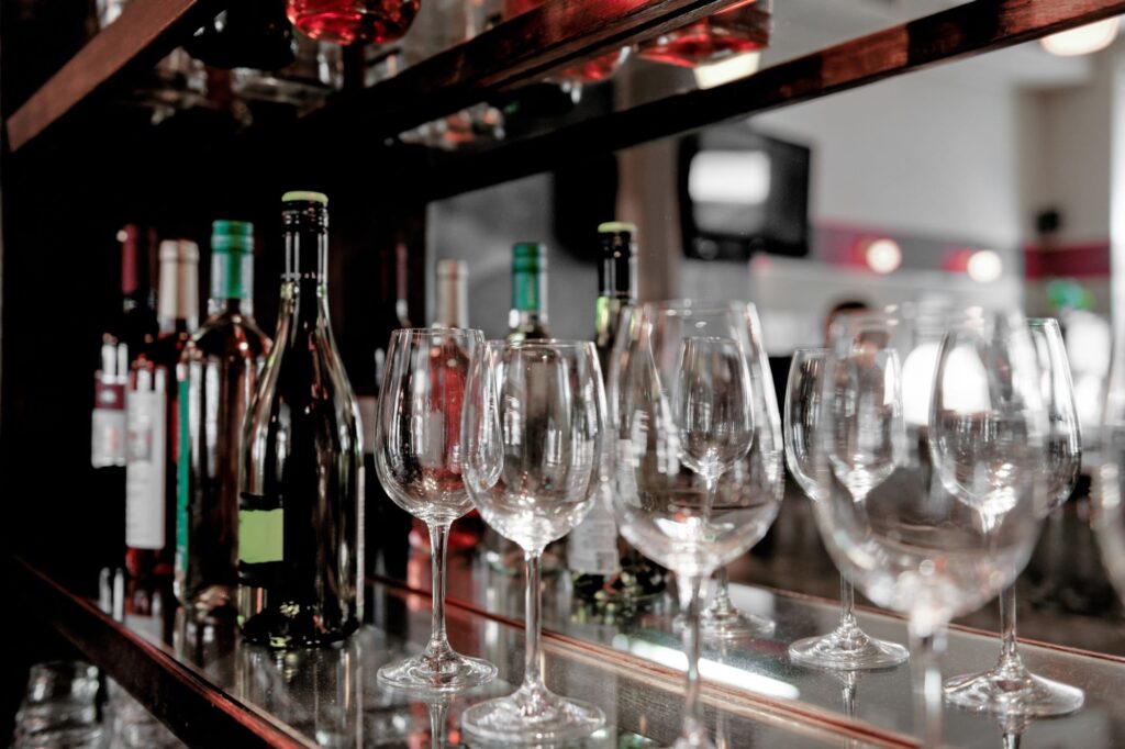 Wine bottles and glasses in the bar