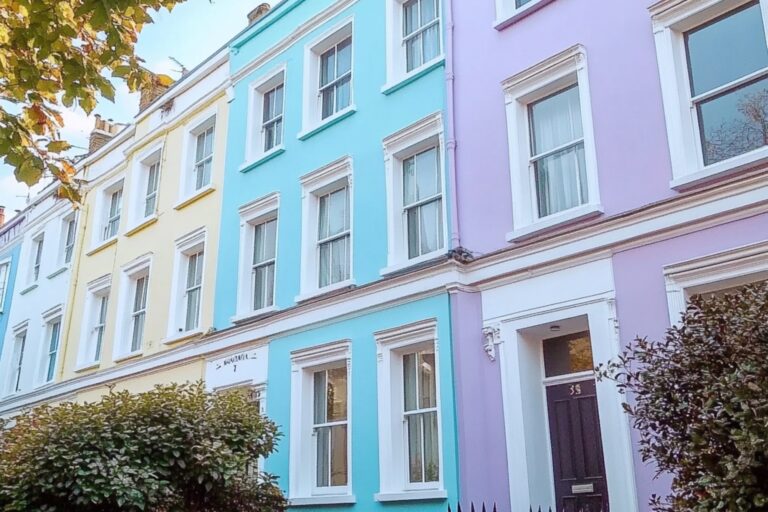 Pastel-coloured terraced houses in the concept of 'best affordable housing options in Chelsea'.