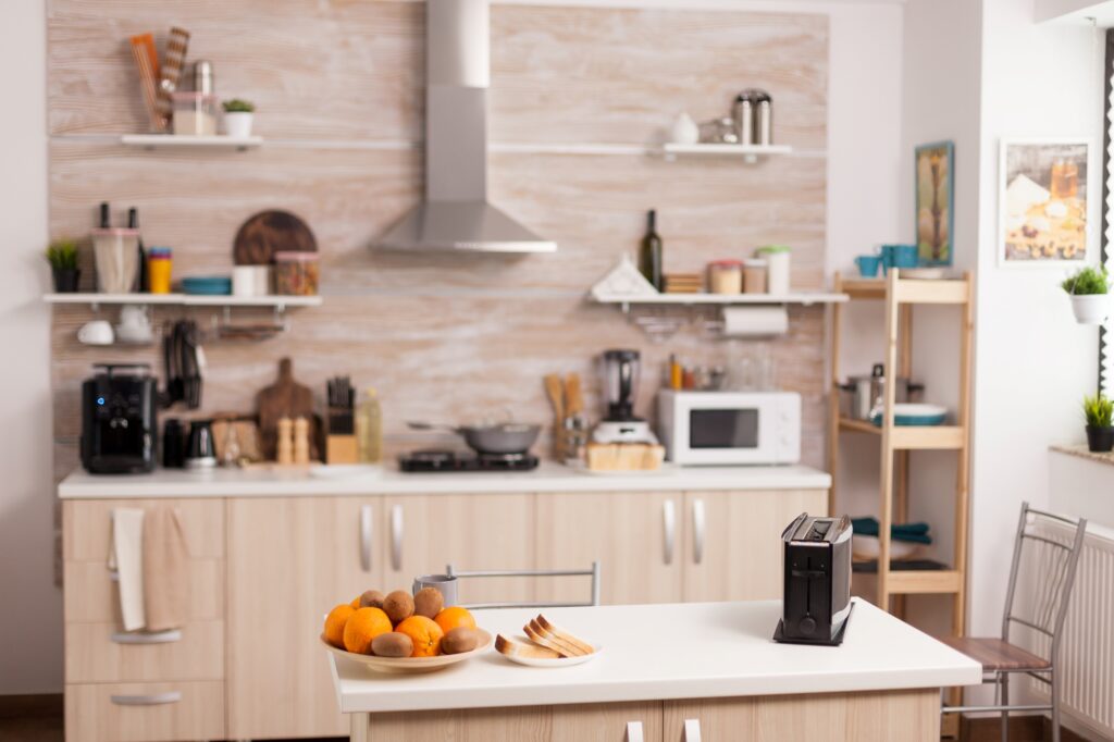 Modern kitchen full of household items and appliances